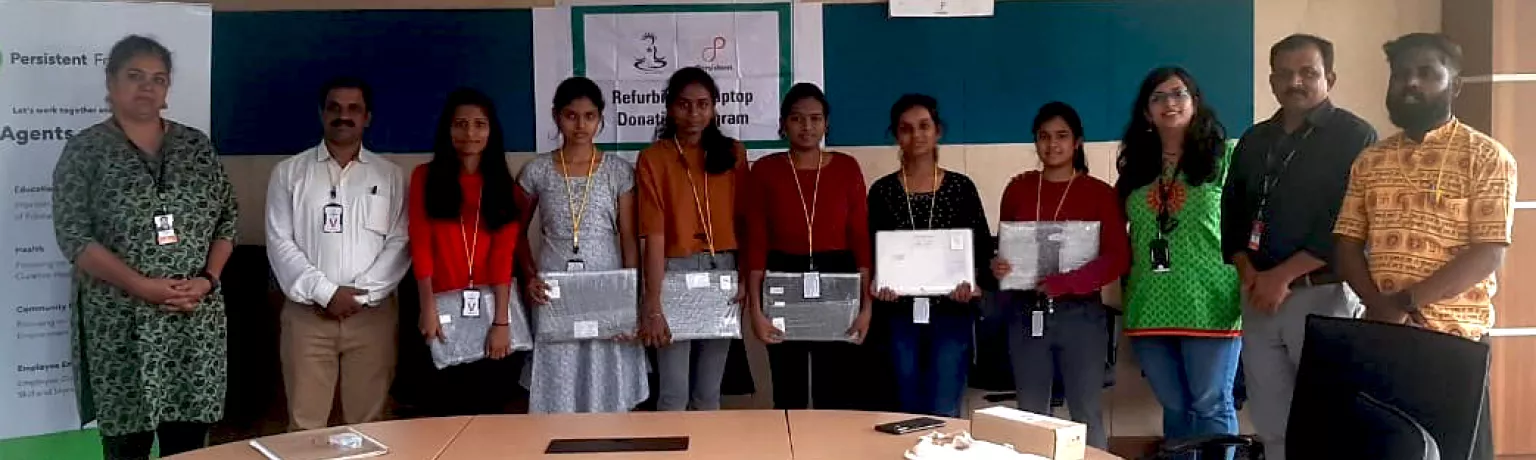 Laptop donation at Persistent Foundation